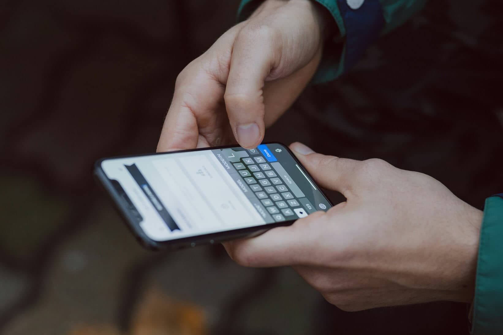 Texting on a cell phone, symbolizing direct and easy communication
